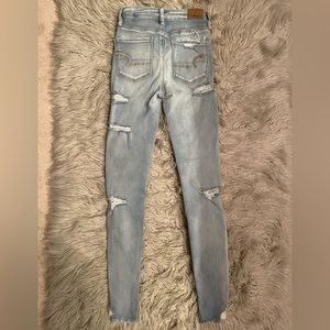 AE distressed skinny jeans light wash